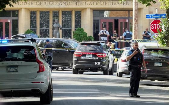 First responders block the crime scene following a shooting at Annunciation Catholic School in Minneapolis Aug. 27.