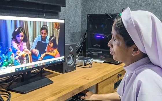 Sr. Seby Thomas, a member of the Missionary Sisters of Mary Immaculate, edits at her studio in Sultan Bathery in the southwestern Indian state of Kerala. (GSR photo/Lissy Maruthanakuzhy)