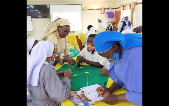 Participants take part in a program training activity on teamwork during the Professional Development for Congregational Leaders program. Designed by African leaders for African leaders, the program recognizes the realities of religious leadership in Africa and offers women religious the skills to lead with faith, resilience and collaboration. (Courtesy of Catherine Cingii)