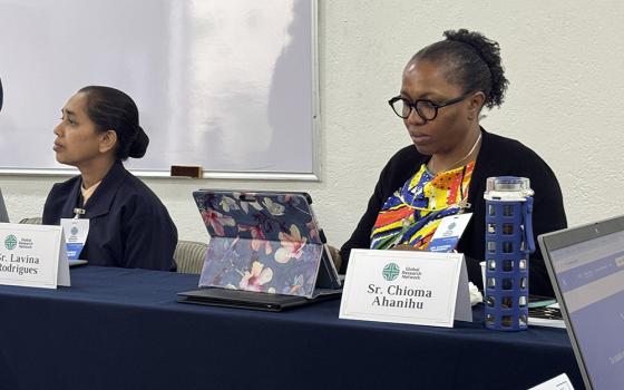 Sr. Chioma Ahanihu takes notes March 27, 2025, in Mexico City at the start of a gathering for sisters involved in data collection. Ahanihu is director of the Center for the Study of Consecrated Life at the Catholic Theological Union in Chicago. (GSR photo/Rhina Guidos) 