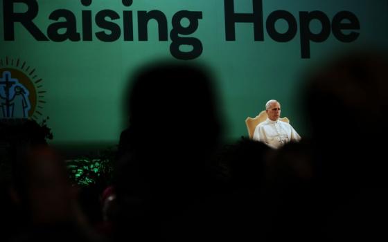 Pope Leo XIV, center, attends the International conference "Raising Hope for Climate Justice" in Castel Gandolfo, Italy, Oct. 1. The conference marks the 10-year anniversary of Laudato Si', Pope Francis' landmark document that encapsulated church teaching on the environment. (AP/Alessandra Tarantino)