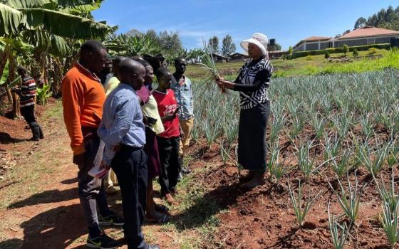 Sr. Flora Nyawira trains a group on leek onion farming. The Sisters of Our Lady of the Good Shepherd run Shalom Farm in Kitale, Kenya. (Mourine Achieng)