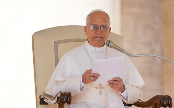 Pope Leo XIV talks to visitors during his weekly general audience in St. Peter's Square at the Vatican Oct. 8. (CNS/Lola Gomez)