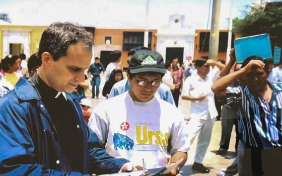 Augustinian Fr. Robert Prevost gathers signatures during a march in Trujillo, Peru, in an undated photo.