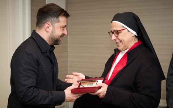 Ukrainian President Volodymyr Zelenskyy awards Argentine Dominican Sr. María Lucía Caram Padilla the Order of Princess Olga, III class, in Madrid Nov. 18, 2025. Caram was honored for her efforts to provide humanitarian aid and support since the beginning of the Russian invasion of Ukraine. (OSV News/Courtesy of Office of the President of Ukraine)
