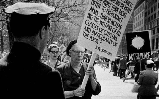 Dorothy Day pickets a civil defense drill in New York City April 17, 1959. (Journey Films/©Vivian Cherry)