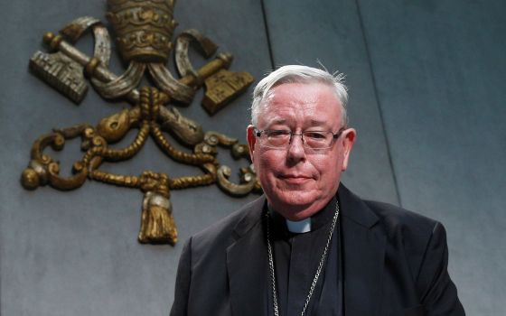 Cardinal Jean-Claude Hollerich of Luxembourg, relator general of the Synod of Bishops, arrives for a news conference to present an update on the synod process at the Vatican Aug. 26. (CNS/Paul Haring)