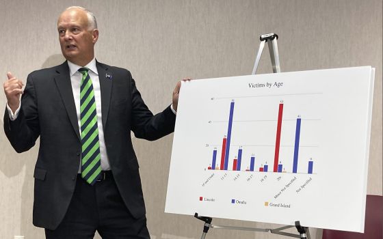 Nebraska Attorney General Doug Peterson discusses the findings of a statewide Catholic church sex abuse investigation on Thursday, Nov. 4, 2021, at a Nebraska Department of Justice office in Lincoln, Neb.  (AP Photo/Grant Schulte)