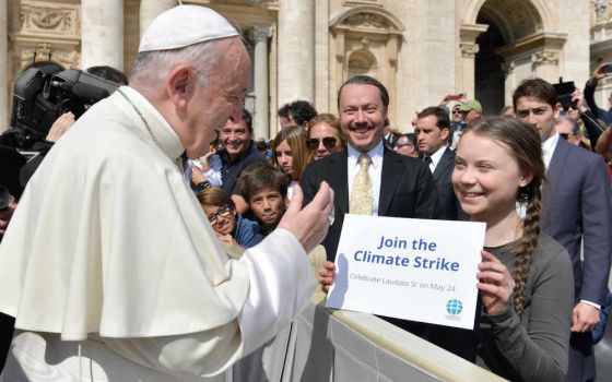 Despite Pope Francis' words in Laudato Si', millions of Catholics, including bishops, are ignoring the looming climate apocalypse and the individual and systemic conversion needed to address it. Pope Francis greets Swedish teenage environmental activist G