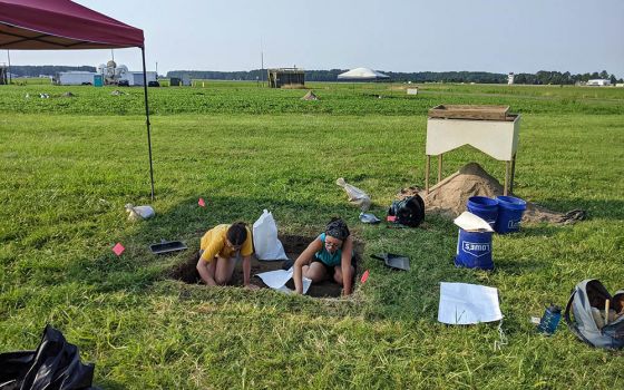 Field technicians Colleen Betti, left, and Danielle Harris-Burnett participate in an archeological dig at a former plantation in St. Inigoes, in southern Maryland, July 7. (RNS/Ken Homan, SJ)