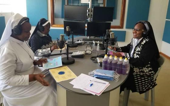 Dominican Sr. Astridah Banda, right, and other sisters get ready for the COVID-19 program on Radio Maria: Yatsani Voice in Lusaka, Zambia.