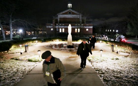 Bishops walk on the grounds of Mundelein Seminary Jan. 2 at the University of St. Mary of the Lake in Illinois, near Chicago. The U.S. bishops began their Jan. 2-8 retreat at the seminary. (CNS/Bob Roller)