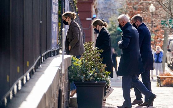 President Joe Biden and family members enter Holy Trinity Catholic Church in Washington Jan. 24. (CNS/Reuters/Erin Scott)