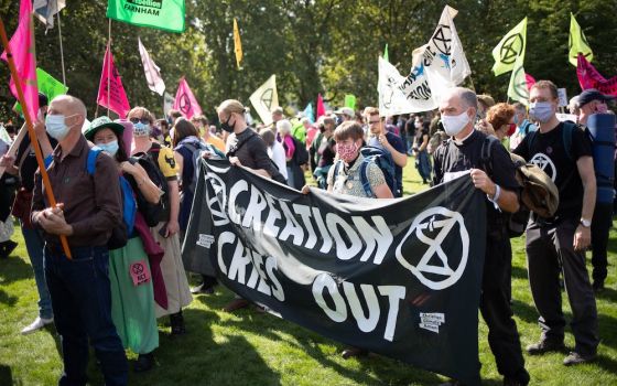 Members of Christian Climate Action take part in a climate change protest in London Sept. 2. (CNS/Courtesy of WCC/Sean Hawkey)