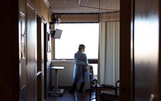 A Walgreens pharmacist prepares the Pfizer-BioNTech coronavirus vaccine at Hamilton Park Nursing and Rehabilitation in the Brooklyn borough of New York City on Jan. 4. (CNS/Reuters/Yuki Iwamura)