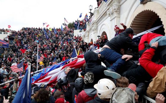 Supporters of President Donald Trump storm into the U.S. Capitol in Washington Jan. 6, 2021, during a rally to contest the certification of the 2020 presidential election. (CNS/Reuters/Shannon Stapleton)