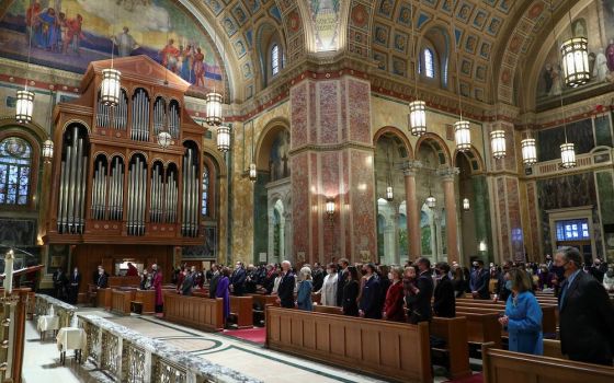 President-elect Joe Biden and his wife, Dr. Jill Biden and Vice President-elect Kamala Harris and her husband, Doug Emhoff, attend Mass with their families before the presidential inauguration at the Cathedral of St. Matthew the Apostle in Washington, D.C