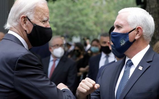 Democratic presidential nominee, former Vice President Joe Biden, left, and Vice President Mike Pence greet each other in New York City Sept. 11, marking the 19th anniversary of the 9/11 aviation terrorist attacks on the U.S. (CNS/Reuters/Amr Alfiky)