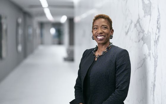 Carla Harris standing in a hallway