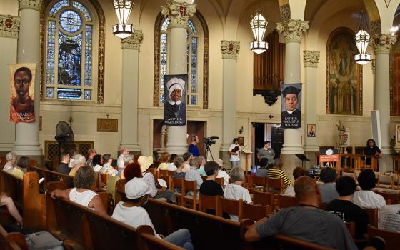 Network Lobby and the Cleveland Network Advocates Team host "Repair and Redress: A Vigil for Reparations" at St. Aloysius-St. Agatha Parish June 15 in Cleveland's Glenville neighborhood. (Network Lobby/Catherine Gillette)