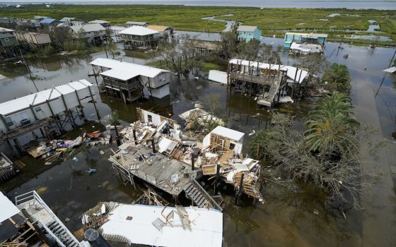 The remains of destroyed homes and businesses are seen in the aftermath of Hurricane Ida in Grand Isle, Louisiana, Aug. 31. (AP/Gerald Herbert)