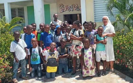 Sr. Gloria Inés Gonzales Ramírez, right, a Dominican Sister of the Presentation of the Blessed Virgin, seeks to change Haiti's educational paradigm as director of a local school and nursery in the semirural commune of Corail.