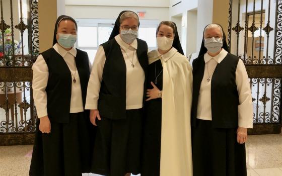 From left, Sisters of Christian Charity Clara, Ann Marie, Mary Amata and Gerardine celebrate the perpetual profession of Sister Mary Amata Aug. 15 in Mendham, New Jersey. (Provided photo)