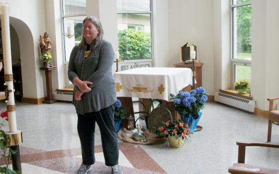 Julie McElmurry receives a blessing at the Poor Clare Monastery in Chesterfield, New Jersey, on her last day filming there in May 2019. (Courtesy of Julie McElmurry)