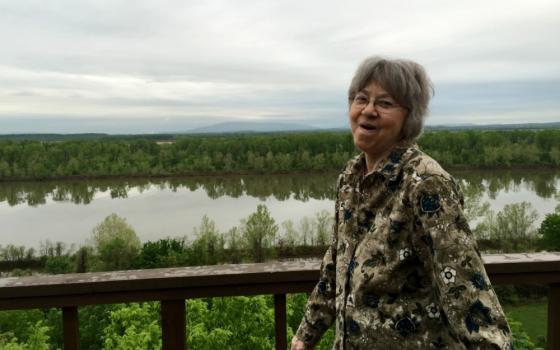 Benedictine Sr. Macrina Wiederkehr on a walk with the writer (Judith Valente)