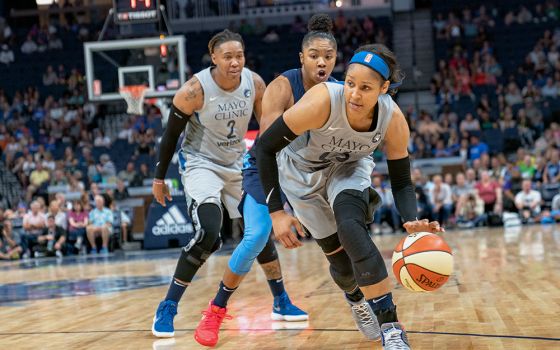 Maya Moore of the Minnesota Lynx dribbles around Alex Bentley of the Atlanta Dream during a WNBA game on Aug. 5, 2018, in Minneapolis. (Wikimedia Commons/Lorie Shaull)