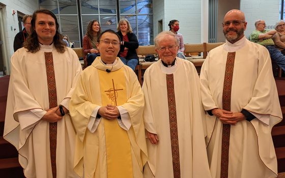 From left: Paulist Frs. Evan Cummings, Jimmy Hsu, Vinny McKiernan and Ed Nowak of the St. Thomas More Newman Center at Ohio State University are pictured in this photo. (Courtesy of Paulist Fathers)