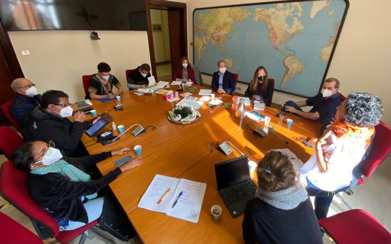 Members of a delegation from Latin America meet with Caritas Internationalis at the Vatican. (Courtesy of Guilherme