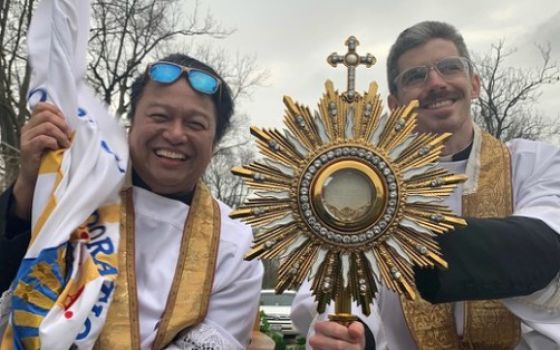 Fr. Santos "Sunny" Castillo, left, and parochial vicar Fr. John Horan of St. John Paul II Catholic Parish in Kankakee, Illinois, drive around parishioners' neighborhoods on Easter morning April 12. (Courtesy of Fr. Santos Castillo)