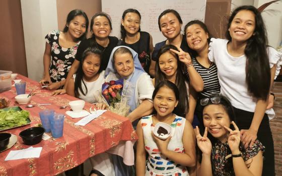 Sr. Sophie de Jésus of the Missionaries of Mary celebrates the feast of the Sacred Heart in June 2020 with some of girls at the School of Life, a residential program that she founded in the Philippines in 2000 for girls ages 14 to 21 to learn life skills 