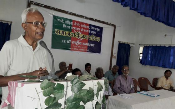 Jesuit Fr. Stan Swamy speaks at a national seminar on social reformers in June 2019 in Bagaicha, India. (Dan Solomon)