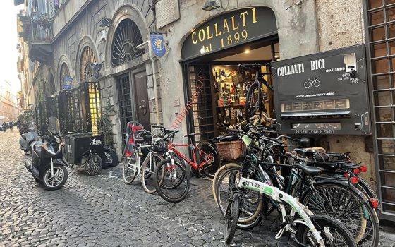 The bicycle shop Collalti's at the Via del Pellegrino in Rome has been selling and repairing bikes since 1889. A new Vatican cycling team was accepted as a member of International Cycling Union in September 2021 at the Vatican. (NCR/Christopher Whit