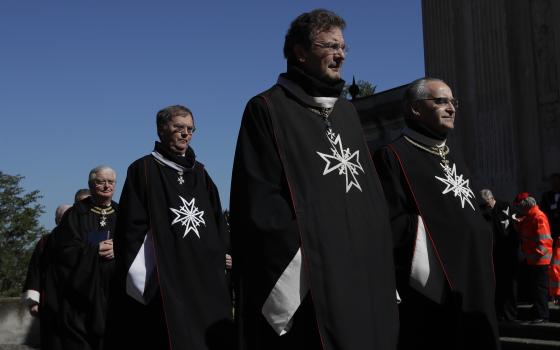 Albrecht von Boeselager, second from right, walks in procession along with other Knights of Malta before the election of the new Grand Master, at the order's Villa Magistrale on Rome's Aventine Hill ahead of the secret balloting on April 29, 2017 (AP Phot