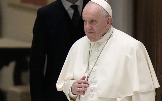 Pope Francis arrives to attend his weekly general audience in the Paul VI Hall at the Vatican, on Jan. 26, 2022. (AP Photo/Alessandra Tarantino, File)