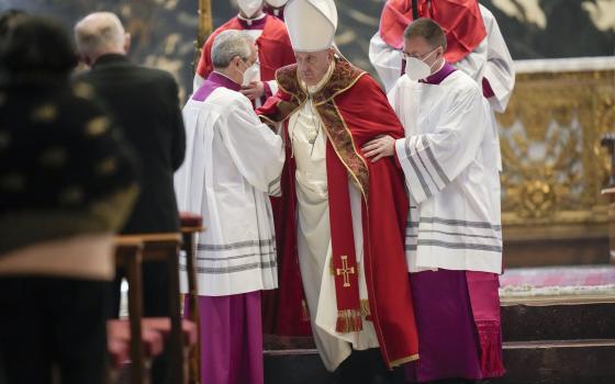 Pope Francis leaves after he presided over the funeral of Cardinal Javier Lozano Barragan, in St.Peter's Basilica at the Vatican, Monday, April 25, 2022. (AP Photo/Andrew Medichini)