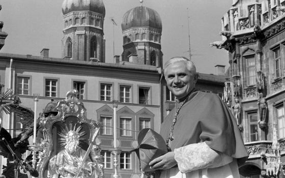 Cardinal Joseph Ratzinger, later Pope Benedict XVI, bids farewell to the Bavarian believers in downtown Munich, Germany, Sunday, Feb. 28, 1982. (AP Photo/Dieter Endlicher, File)