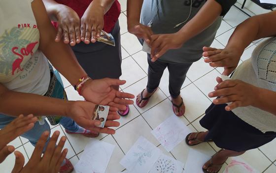 A group of women take part in a prayer to bless absent loved ones, as part of the Comboni Missionary Sisters' "Effatá" program to assist migrants in Tapachula, in the state of Chiapas, Mexico. (Courtesy of Pompea Cornacchia)