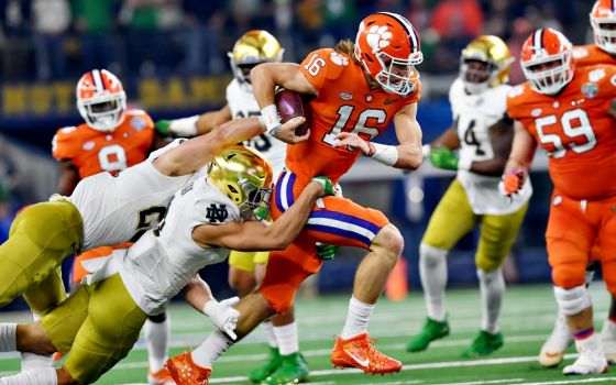 Clemson quarterback Trevor Lawrence (16) is seen in action at the NCAA football Cotton Bowl between the Clemson Tigers and the Notre Dame Fighting Irish in Arlington, Texas, Dec. 29, 2018. (Newscom/Cal Sport Media/Marinmedia.org/Joe Calomeni)