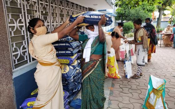 Sisters of the Little Flower of Bethany distribution of provisions in Jharkhand, India, during the coronavirus pandemic. (Courtesy Women's Religious Conference India)