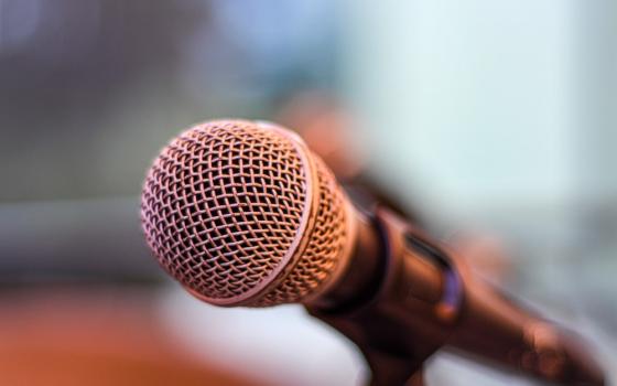 Close up of a microphone (Unsplash/Robinson Recalde)