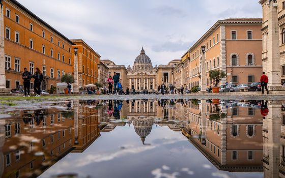 St. Peter's Basilica at the Vatican is seen from a street in Rome. (Unsplash/Shai Pal)