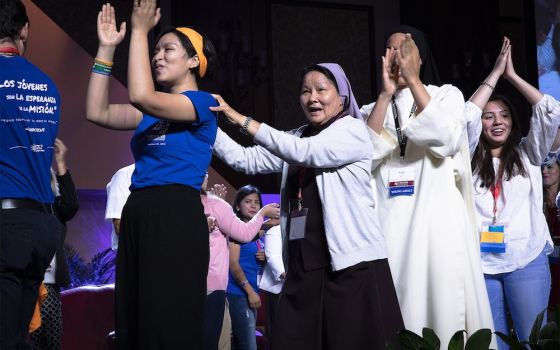 Delegates celebrate at the closing session of a gathering of Hispanic Catholics in Texas in September. Among Americans ages 18-29, 9% are Hispanic Catholics, while 8% are white Catholics. (CNS photo/Tyler Orsburn)