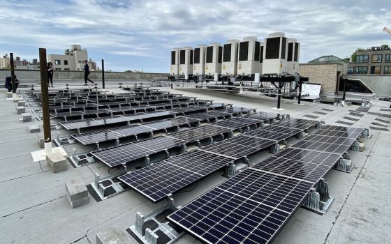 Solar panels in New York City are seen atop the Bishop Thomas V. Daily Residence in the Prospect Heights neighborhood of Brooklyn, New York. It is the first of four buildings receiving panels in a pilot project for the affordable housing units managed by 