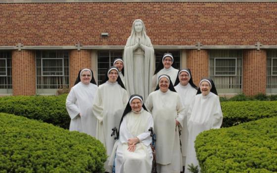 Eight of the nine nuns who are part of the Cloistered Dominican Nuns of the Perpetual Rosary in Lancaster, Penn. (GSR photo / Colin Evans)