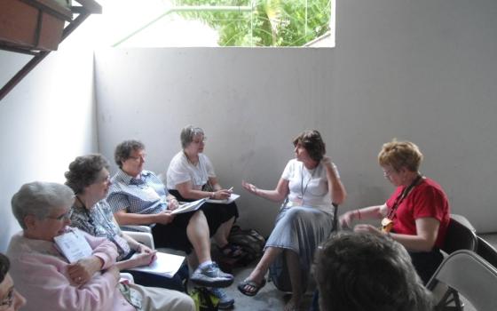 Members of the SHARE delegation meet in El Salvador Nov. 29. (Courtesy of SHARE)