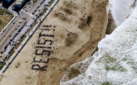 Anti-Trump protesters on Ocean Beach in San Francisco on Feb. 11, 2017